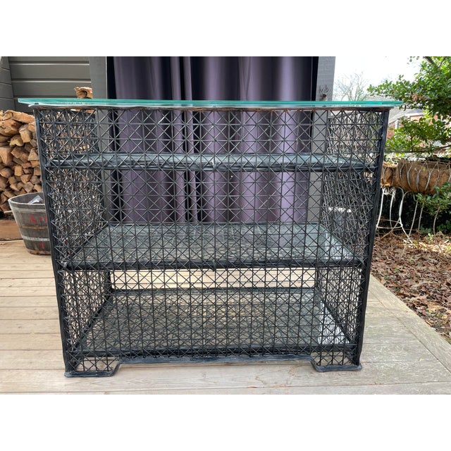 A fabulous Palm Beach style outdoor dry bar with a spun fiberglass frame in the style of Russell Woodard. There are no...