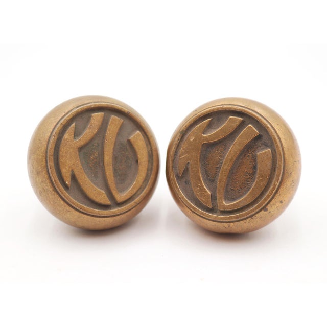 1930s emblematic passage door knobs made of bronze with a patina finish. The manufacturer is unknown. It is part of the...