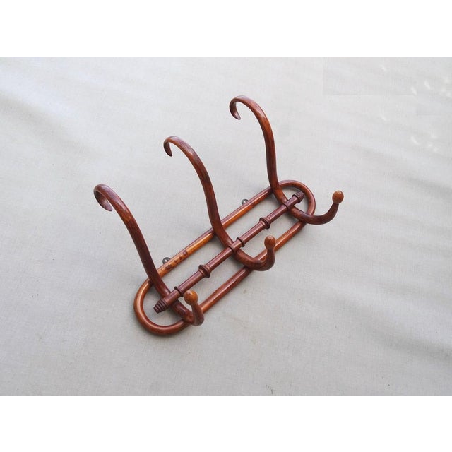Beautiful patina with signs of age, two original fixing hooks.