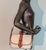The equestrian large shoulder bag, the classic Dooney and Burke.