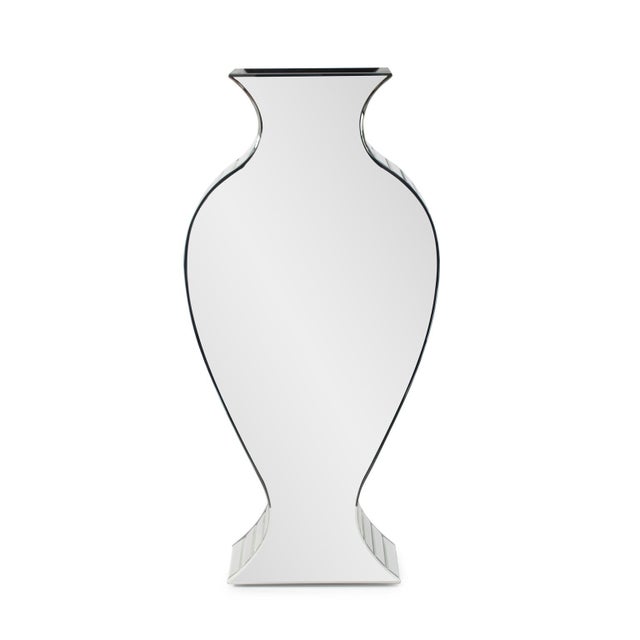 This mirrored vase is simple, yet elegant and full of style. It features a curvy shape with beveled mirrors on the front...