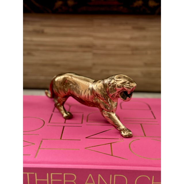 Vintage Brass! This is a large vintage solid brass tiger. I love the character it would bring to a coffee table, self or...