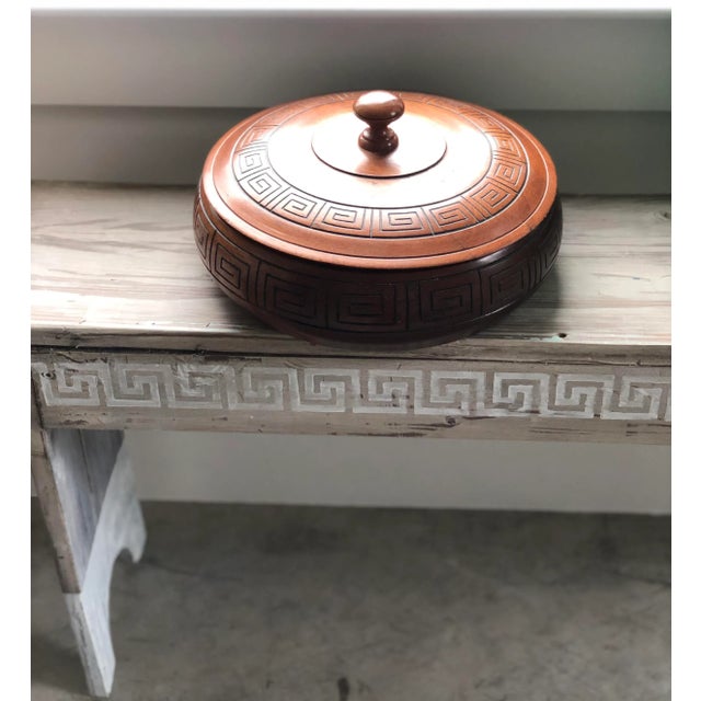 Rich and delicious caramel color under a light wax finish and perfectly accented in a Greek key pattern. One remote, two...