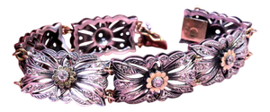 Gold and Silver Bracelet with Central Zirconias and Flower-Shaped Applications