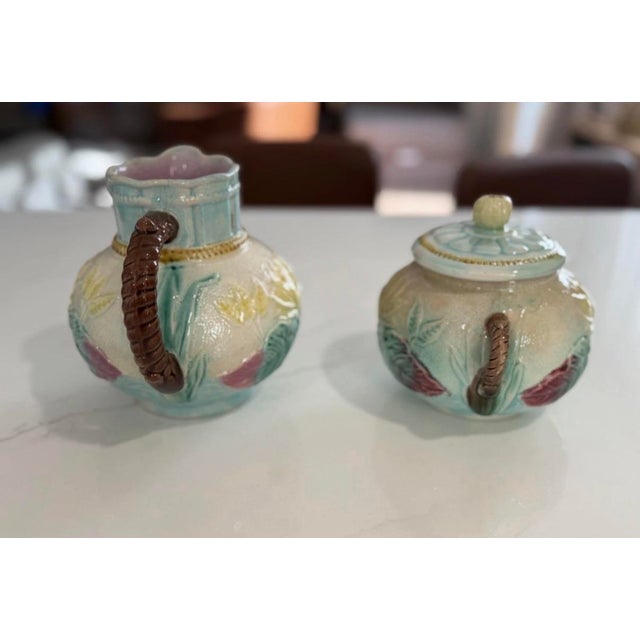 An exceptional, highly collectible pair of late 19th-century English Victorian majolica hollowware in the desirable 'Pond...