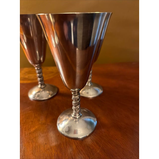 The J. Perez Ruiz Silverplated 7" Twisted Stem Goblets are a set of 6 elegant and timeless pieces perfect for all...