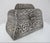Traditional antique South Asian lidded chest box. Embossed silver metal alloy showing an intricate scrolling flower...