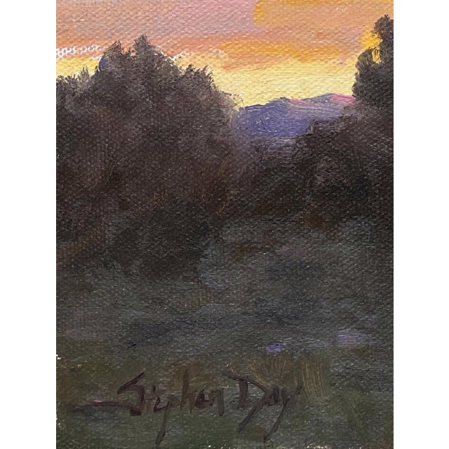 This oil on panel painting captures the tranquil beauty of a sunrise over a high valley, with soft hues of pink and orange...