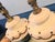 Beautiful Mid Century large iridescent glass lamps . They are decorated with brass draping all around each glass body. The...