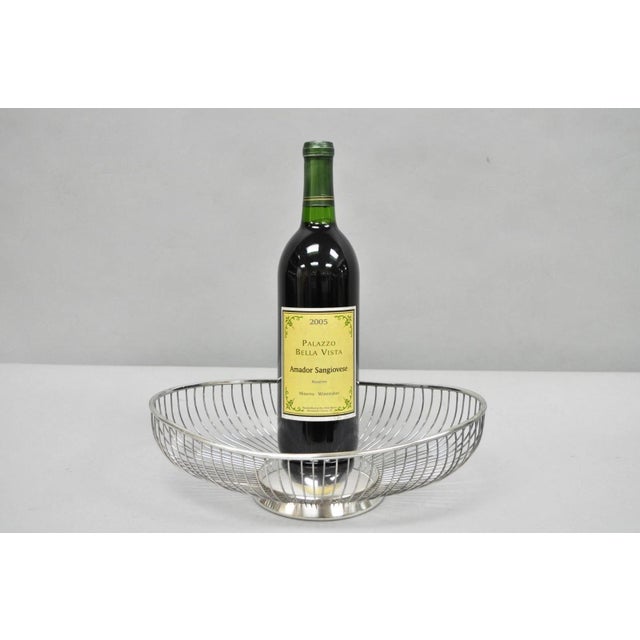 Vintage Mid Century Modern Eales Italy Silver Plated Wire Fruit Bread Basket. Circa Late 20th Century. Measurements: 3.5"...