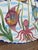 Bring a splash of the Mediterranean home with this vibrant hand-painted Vietri oval wall platter featuring a whimsical...