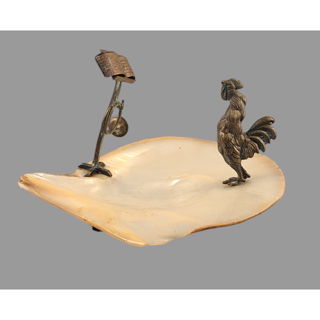 This antique Austrian bronze calling card trinket tray features a Crowing rooster figurine facing a music stand and...