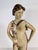This Rare Porcelain Art Deco Nude Figural Statue from the 1940's exudes elegance and artistry. I have extensively searched...