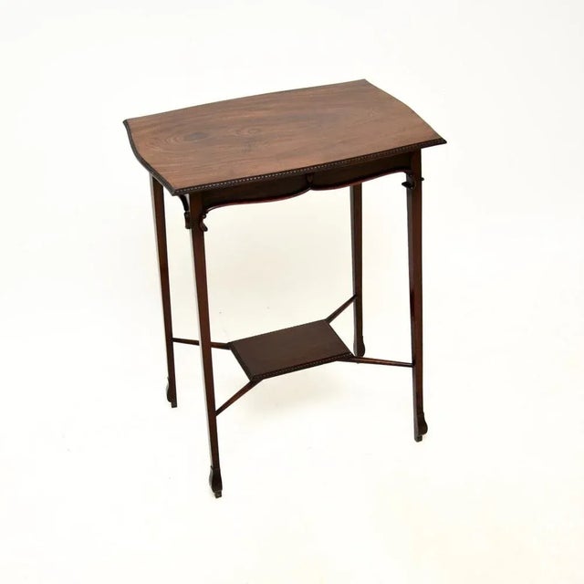 A beautiful and elegant antique Edwardian occasional side table. This was made in England, it dates from around the...