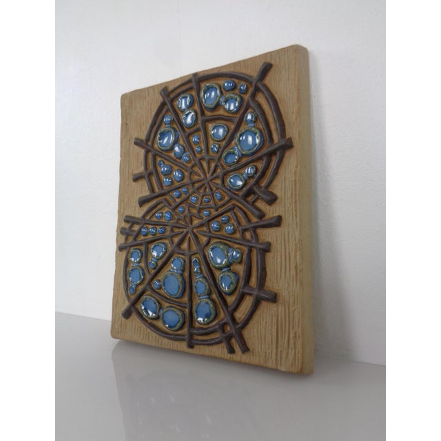 Ceramic wall hanging by Marianne Starck for Michael Andersen from the 1960s. Signed several times. This piece has an...