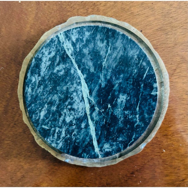 1970's green marble round wine bottle holder with gold grapevine. The wine bottle holder is 6" long and 2" tall. Inside is...