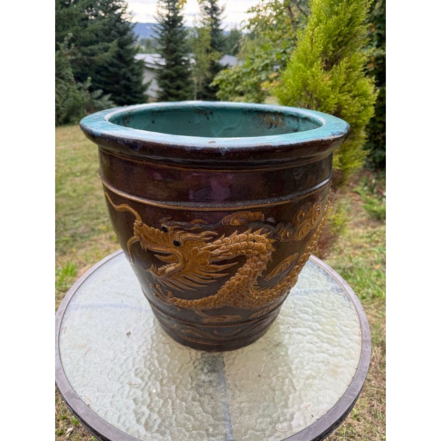 Antique Quing Shiwan-Style Dragon Egg Pot Jardinière with turquoise interior.