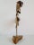 Mid Century Modern Curtis Jere Brutalist brass sculpture with onyx base featuring two owls perched on branch with percing...