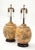 Wonderful pair of 1960's large Italian ceramic lamps. The vessel shaped lamps have a textured "Scavo" glazed finish and...