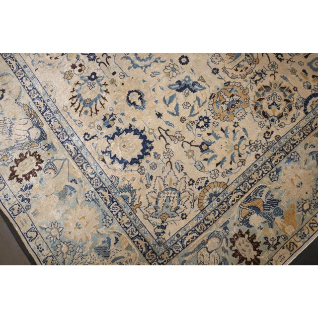 Authentic early 20th century earth toned Persian Tabriz featuring a pictorial border with mysterious angels. Great color,...