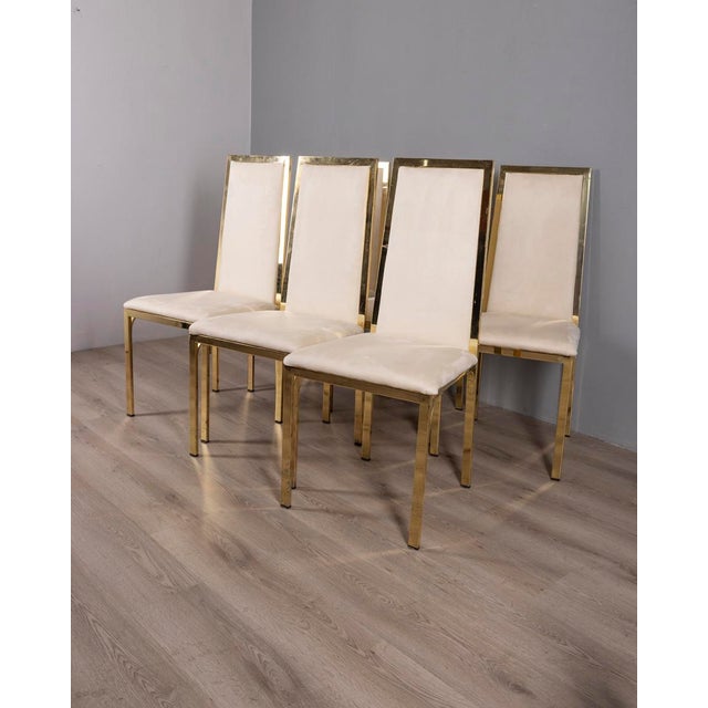 Set of six chairs with gold-plated brass frame, white velvet upholstery, designed by Renato Zevi, 1970s. I have official...