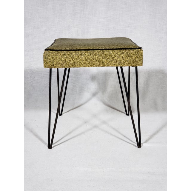 Wonderful vintage original vinyl wrapped black metal hairpin leg stool. Sturdy and in good condition with some miner wear....