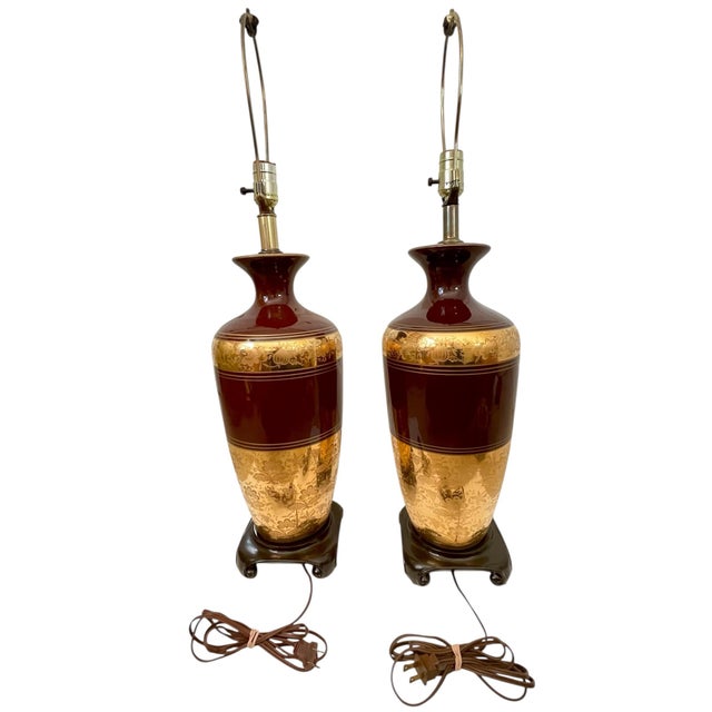 This vintage pair of ceramic chocolate brown and gold embossed vase lamps stand at 32 inches tall. The large table lamps...