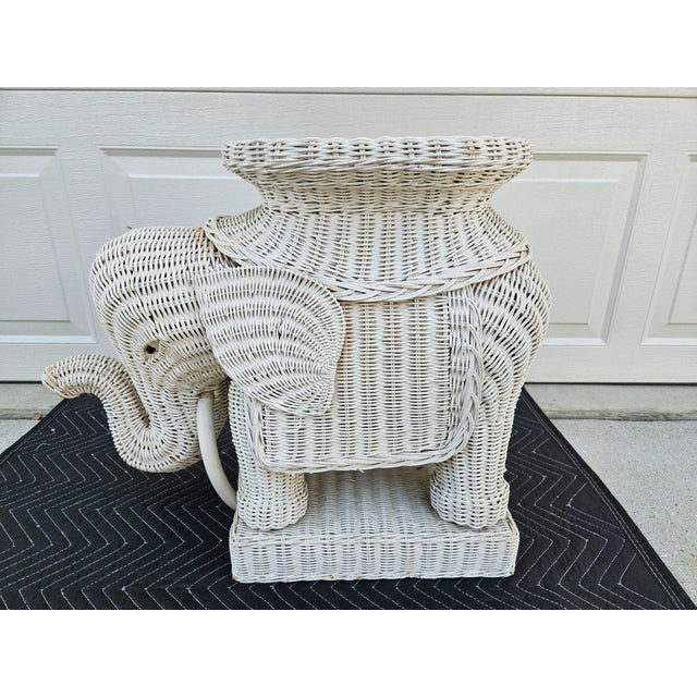 The classic, yet always stylish white wicker elephant side table or garden stool. This piece has its tusks. This piece is...