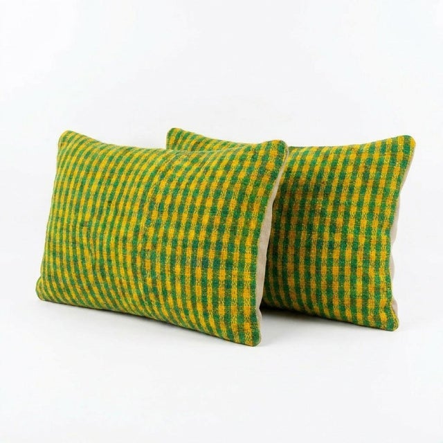 This beautiful 16'' x 24'' pillow cover set was made from authentic Turkish rug pieces. Bright colors of wool adorn the...