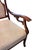 Elegant antique Victorian parlor armchair from the later 19th century to early 20th century, 1890-1910, featuring a richly...