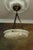 German Art Deco alabaster pendant light, circa 1920s. Large pendant featuring a white alabaster bowl with pronounced dark...