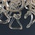 Ceiling lamps from the 'Giogali' series with transparent Murano glass pendants woven around a chromed metal frame....