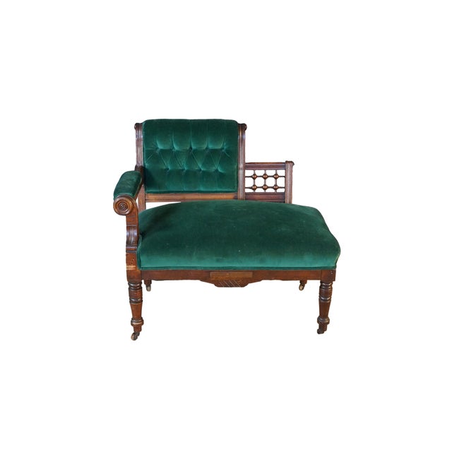 This unique antique walnut parlor Settee or loveseat also known as a gossip bench, telephone chair or corner chair, blends...