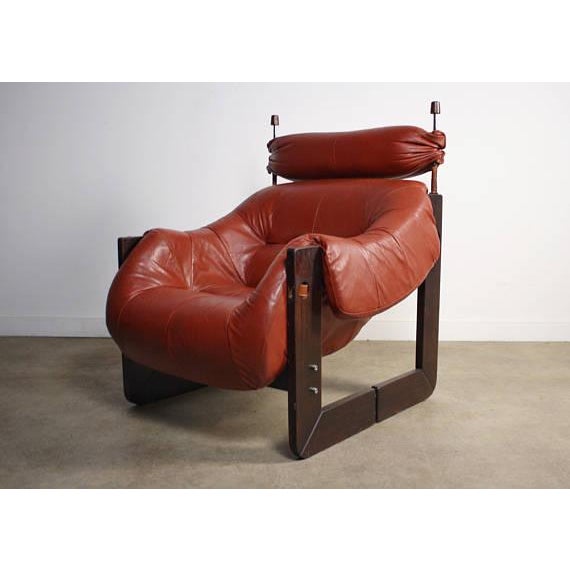 About the Percival Lafer Rosewood Framed Lounge Chair w Rose Leather Seat The lines on this Percival Lafer Chair are...