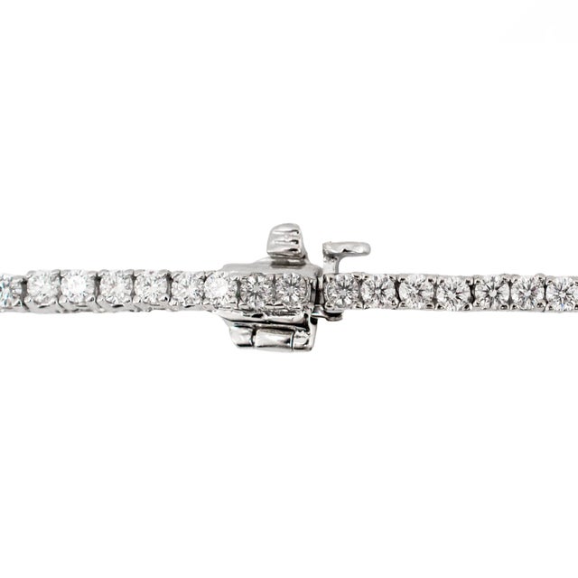 Gender: Ladies Metal Type: 18K white Gold Length: 18.00 inches Width: 2.20 mm Weight: 18.87 grams Ladies rhodium plated...