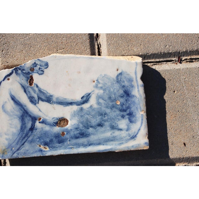 Circa: 18th Century. Country: Portugal. Material: Earthenware, Tin-glazed pottery. Note: This tile was once part of a...