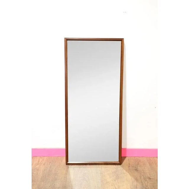 A beautiful mid century trak framed mirror with a gorgeous grain. Can be wall hung. Dims W17.25 H38.5