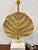 John Richard Modern Lamp. Gold leaf shaped body on marble base. Showroom floor sample.