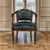 An antique French Louis XVI armchair by Hirler of Alsace, crafted in mahogany, pairs neoclassical elegance with the...