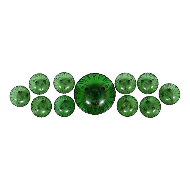 A set of eleven emerald green depression era glass bowls, made by Anchor Hocking for their Inspiration collection, circa...
