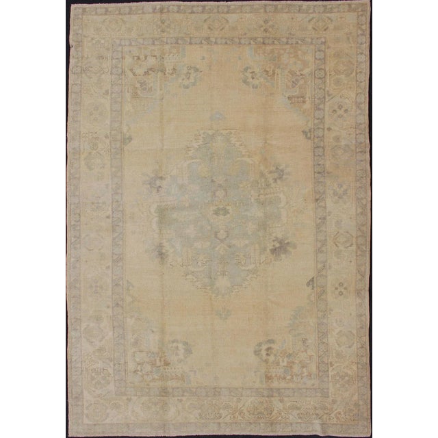 Oushak Vintage Turkish Rug With Faded Central Medallion Design in Cream Colors For Sale - Image 13 of 13