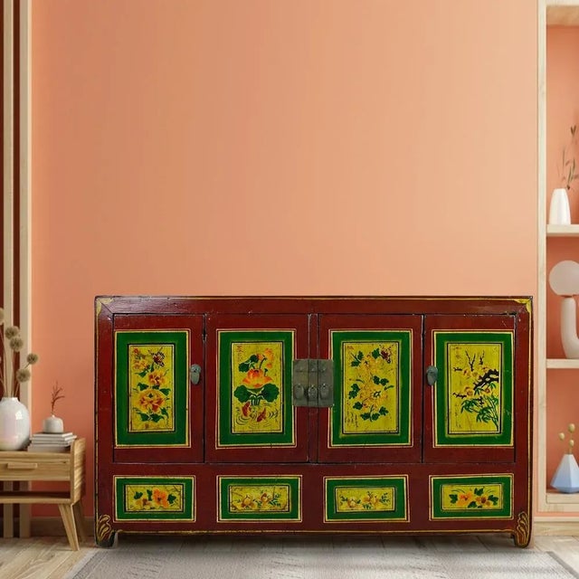 This lovely vintage Chinese coffer has 4 paneled doors adorn by hand painted flowers, plants, gold fish, and butterflies....