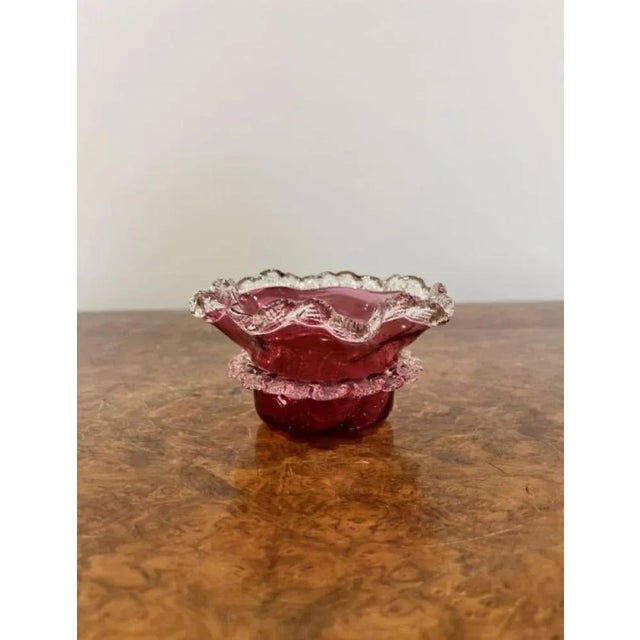 Antique Victorian quality cranberry glass bowl having a quality original Cranberry glass bowl with a lovely shaped top and...