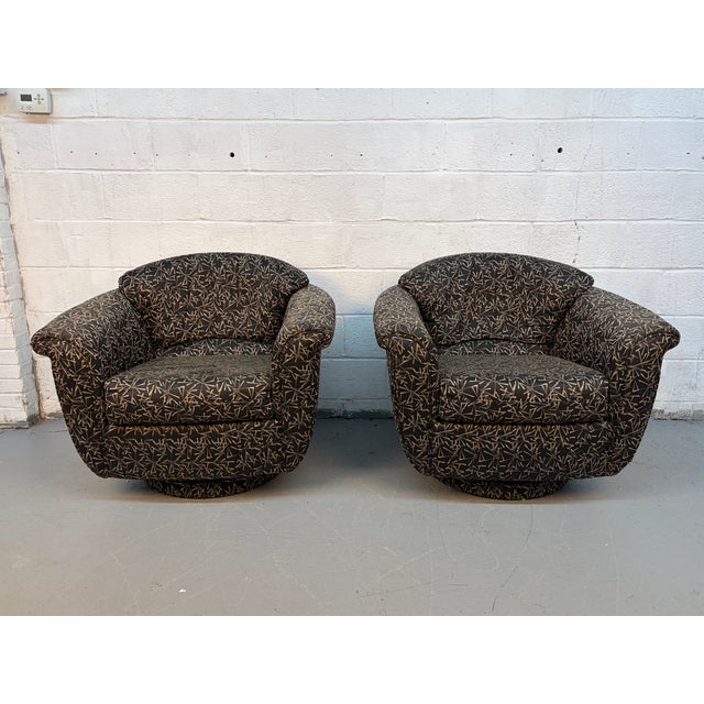 Comfortable and stylish, this pair of oversized club chairs offers a bold, modern look with inviting proportions....