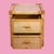 Charming vintage nightstand attributed to Bielecky Brothers, crafted from twisted rattan with woven cane drawer fronts....