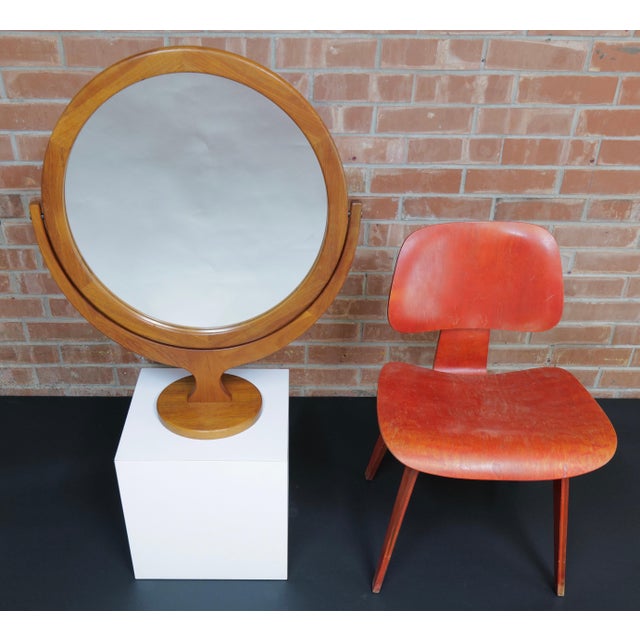 This large 24-inch round tabletop mirror by Pedersen & Hansen is a striking example of mid-century Danish design. Crafted...