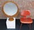 This large 24-inch round tabletop mirror by Pedersen & Hansen is a striking example of mid-century Danish design. Crafted...