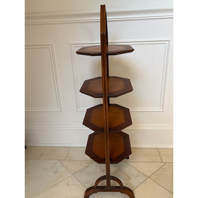 This dainty mahogany and maple tea stand was my mother‘s and has been in my childhood home since the 1940s. She used it...