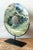 Presenting a captivating vintage Asian green marble bi disk, a striking decorative object that brings natural elegance and...