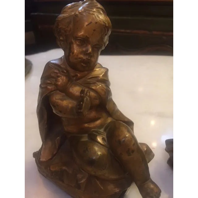 Pair of Gold Bronze Baby Girl and Boy Statue. 4" W 3" D 6" Tall